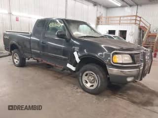 2000 Ford F-150 XL with VIN 1FTRX18W0YNA18059, listed as a IAAI auction lot 43131249 with Not provided miles and . Bid and sale history available at DreamBid. Image 1.
