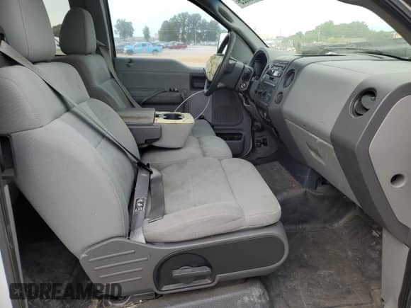 2004 Ford F-150 STX z VIN 1FTRX12W14NA77236, wystawiony jako Copart lot #65958825 z przebiegiem 176 522 mil mil oraz Szkoda całkowita • Salvage title. Historia ofert i sprzedaży dostępna na DreamBid. Obrazek 7.