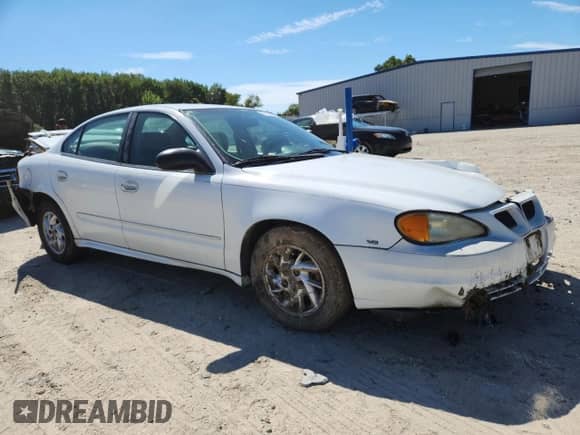 2004 Pontiac Grand Am SE1 with VIN 1G2NF52E44C212807, listed as a Copart auction lot 70111845 with 115,492 mi miles and Salvage title. Bid and sale history available at DreamBid. Image 4.