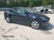 2022 Tesla Model Y Long Range with VIN 7SAYGDEE9NF455340, listed as a Copart auction lot 66966654 with 22,707 mi miles and Salvage title. Bid and sale history available at DreamBid. Image 4.