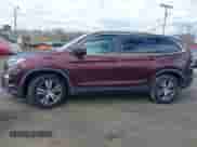 2017 Honda Pilot EX-L with VIN 5FNYF6H74HB040889, listed as a IAAI auction lot 42040094 with 84,001 mi miles and . Bid and sale history available at DreamBid. Image 14.