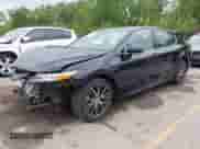 2021 Toyota Camry Hybrid XLE with VIN 4T1F31AK8MU563752, listed as a IAAI auction lot 42134620 with 19,484 mi miles and . Bid and sale history available at DreamBid. Image 2.