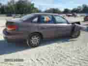 2000 Saturn LS with VIN 1G8JU52F3YY697730, listed as a Copart auction lot 83969324 with 176,491 mi miles and Salvage title. Bid and sale history available at DreamBid. Image 3.