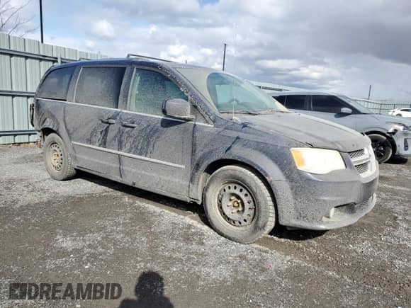 2014 Dodge Grand Caravan Crew z VIN 2C4RDGDG1ER241445, wystawiony jako Copart lot #49628435 z przebiegiem 207 008 mil mil oraz Szkoda całkowita • Salvage title. Historia ofert i sprzedaży dostępna na DreamBid. Obrazek 4.