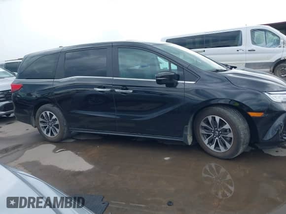 2021 Honda Odyssey EX-L with VIN 5FNRL6H77MB038996, listed as a IAAI auction lot 42647748 with 22,535 mi miles and . Bid and sale history available at DreamBid. Image 13.