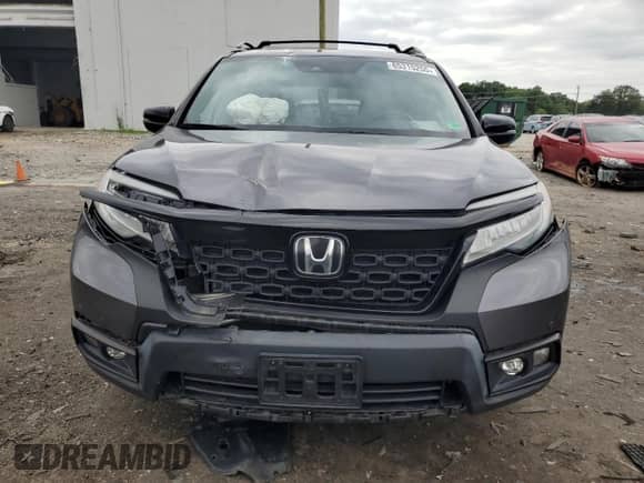 2020 Honda Passport Touring with VIN 5FNYF8H9XLB007353, listed as a Copart auction lot 65315255 with 121,644 mi miles and Salvage title. Bid and sale history available at DreamBid. Image 5.
