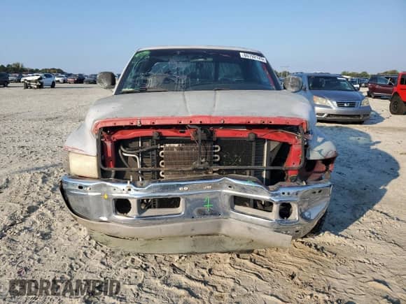 1999 Dodge 1500 z VIN 3B7HC12Y4XG177384, wystawiony jako Copart lot #80792125 z przebiegiem 136 578 mil mil oraz Szkoda całkowita • Salvage title. Historia ofert i sprzedaży dostępna na DreamBid. Obrazek 5.