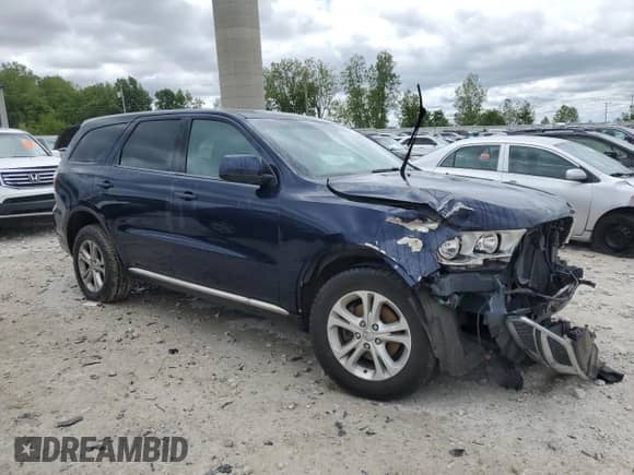 2013 Dodge Durango SXT with VIN 1C4RDJAG1DC662932, listed as a Copart auction lot 57784465 with 189,398 mi miles and Clean title. Bid and sale history available at DreamBid. Image 4.