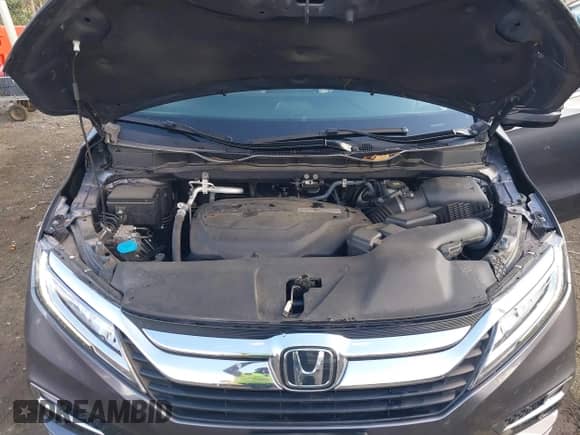 2018 Honda Odyssey Elite z VIN 5FNRL6H91JB071957, wystawiony jako IAAI lot #43506915 z przebiegiem 75 656 mil mil oraz . Historia ofert i sprzedaży dostępna na DreamBid. Obrazek 10.