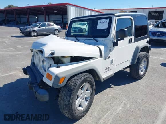2005 Jeep Wrangler X z VIN 1J4FA39S95P338440, wystawiony jako IAAI lot #43464678 z przebiegiem 114 067 mil mil oraz . Historia ofert i sprzedaży dostępna na DreamBid. Obrazek 17.
