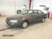 1996 Toyota Camry DX z VIN 4T1BG12K9TU949712, wystawiony jako IAAI lot #42982766 z przebiegiem 258 942 mil mil oraz . Historia ofert i sprzedaży dostępna na DreamBid. Obrazek 2.