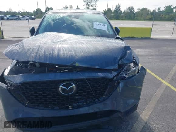 2024 Mazda CX-5 S Preferred z VIN JM3KFBCMXR0353299, wystawiony jako IAAI lot #42919399 z przebiegiem 56 673 mil mil oraz . Historia ofert i sprzedaży dostępna na DreamBid. Obrazek 6.