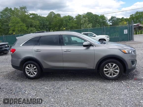 2018 Kia Sorento LX z VIN 5XYPGDA52JG365934, wystawiony jako IAAI lot #42341274 z przebiegiem 116 000 mil mil oraz . Historia ofert i sprzedaży dostępna na DreamBid. Obrazek 13.