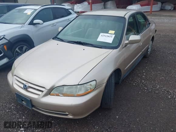 2002 Honda Accord LX with VIN 1HGCG55462A108462, listed as a IAAI auction lot 42515819 with 260,945 mi miles and . Bid and sale history available at DreamBid. Image 2.
