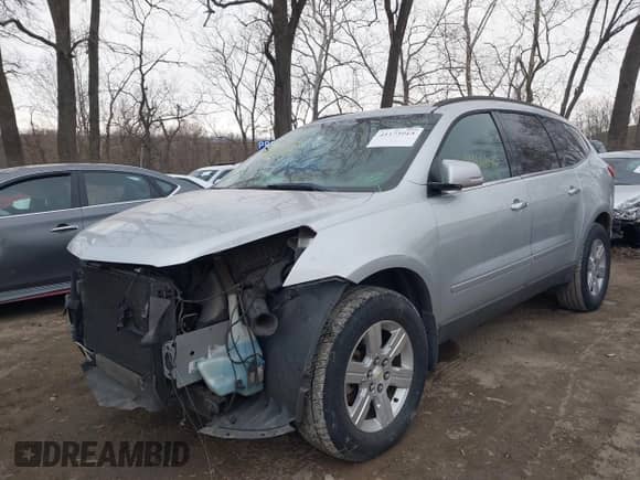 2012 Chevrolet Traverse 1LT with VIN 1GNKRGED8CJ100260, listed as a IAAI auction lot 41173915 with 214,686 mi miles and . Bid and sale history available at DreamBid. Image 6.