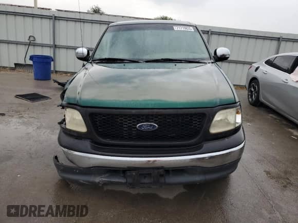 1999 Ford F-150 с VIN 1FTZX1728XKA44035, выставлен на аукционе Copart как лот 71719835 с пробегом 2 127 894 миль миль и Списание • Salvage title. История ставок и продаж доступна на DreamBid. Изображение 5.