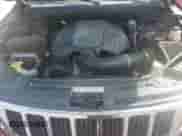 2013 Jeep Grand Cherokee Limited z VIN 1C4RJFBT9DC625984, wystawiony jako Copart lot #80372785 z przebiegiem 143 524 mil mil oraz Szkoda całkowita • Salvage title. Historia ofert i sprzedaży dostępna na DreamBid. Obrazek 12.