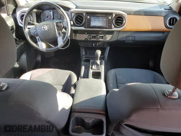 2019 Toyota Tacoma SR5 with VIN 3TMBZ5DN5KM019662, listed as a Copart auction lot 71650075 with 105,601 mi miles and Salvage title. Bid and sale history available at DreamBid. Image 8.
