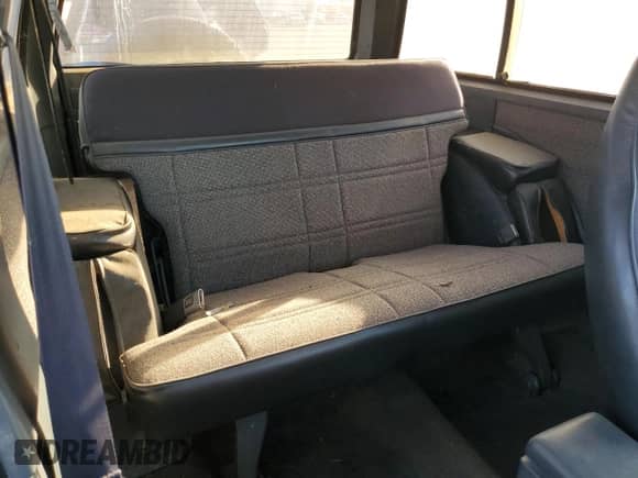 1986 Chevrolet Blazer z VIN 1G8CT18RXG8180574, wystawiony jako Copart lot #87987925 z przebiegiem 82 571 mil mil oraz Szkoda całkowita • Salvage title. Historia ofert i sprzedaży dostępna na DreamBid. Obrazek 11.