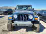 2001 Jeep Wrangler SE with VIN 1J4FA29PX1P372693, listed as a Copart auction lot 83862835 with 132,933 mi miles and Clean title. Bid and sale history available at DreamBid. Image 5.