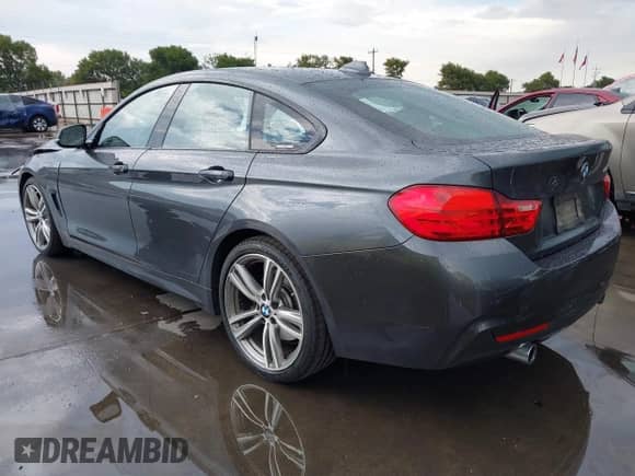 2017 BMW 4 Series 440i with VIN WBA4E3C59HG187184, listed as a IAAI auction lot 42990913 with 79,418 mi miles and . Bid and sale history available at DreamBid. Image 3.