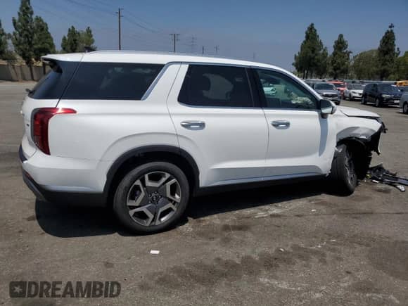 2025 Hyundai Palisade SEL Premium z VIN KM8R4DGE9SU872737, wystawiony jako Copart lot #69227085 z przebiegiem 1 736 mil mil oraz Szkoda całkowita • Salvage title. Historia ofert i sprzedaży dostępna na DreamBid. Obrazek 3.
