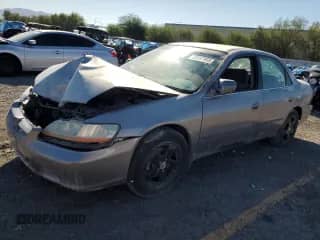 2000 Honda Accord LX with VIN 1HGCG1644YA012541, listed as a Copart auction lot 82137065 with 209,226 mi miles and Salvage title. Bid and sale history available at DreamBid. Image 1.