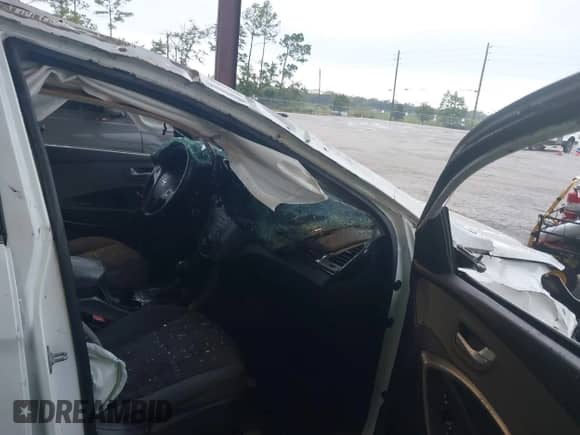 2014 Hyundai Santa Fe с VIN 5XYZT3LB3EG147329, выставлен на аукционе IAAI как лот 43179338 с пробегом 130 886 миль миль и . История ставок и продаж доступна на DreamBid. Изображение 5.