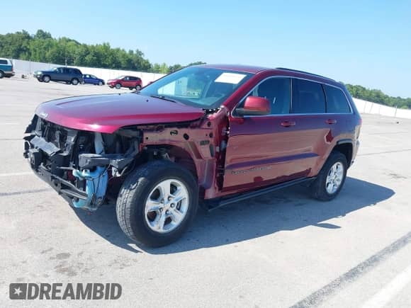 2017 Jeep Grand Cherokee Laredo with VIN 1C4RJFAG6HC671217, listed as a IAAI auction lot 42948865 with 86,856 mi miles and . Bid and sale history available at DreamBid. Image 2.