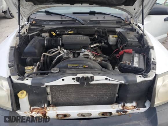 2006 Dodge Dakota z VIN 1D7HW22N46S634422, wystawiony jako Copart lot #82048275 z przebiegiem 190 207 mil mil oraz Nie do naprawy • Non repairable. Historia ofert i sprzedaży dostępna na DreamBid. Obrazek 11.