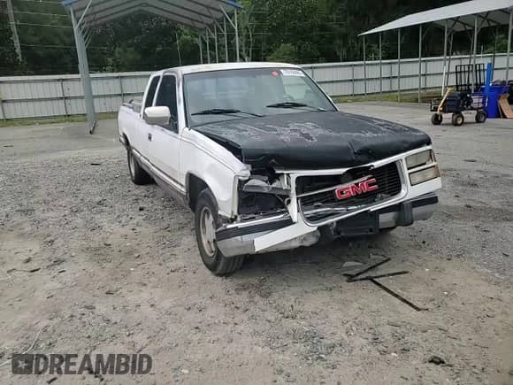 1994 GMC Sierra 1500 z VIN 2GTEC19K5R1587191, wystawiony jako Copart lot #70108465 z przebiegiem 215 236 mil mil oraz Szkoda całkowita • Salvage title. Historia ofert i sprzedaży dostępna na DreamBid. Obrazek 13.