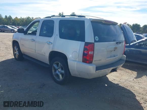 2012 Chevrolet Tahoe LTZ with VIN 1GNSKCE04CR116578, listed as a IAAI auction lot 43337709 with 251,212 mi miles and . Bid and sale history available at DreamBid. Image 3.