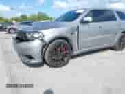 2018 Dodge Durango SRT with VIN 1C4SDJGJ6JC366644, listed as a IAAI auction lot 41906182 with 54,490 mi miles and . Bid and sale history available at DreamBid. Image 2.
