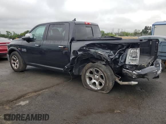 2018 Ram 1500 Laramie z VIN 1C6RR7NT3JS262410, wystawiony jako Copart lot #69724445 z przebiegiem 107 458 mil mil oraz Szkoda całkowita • Salvage title. Historia ofert i sprzedaży dostępna na DreamBid. Obrazek 2.