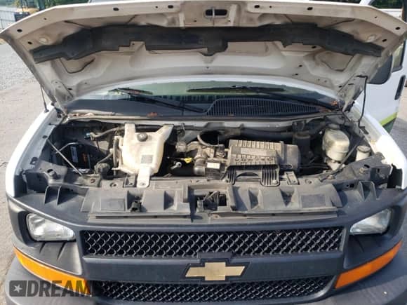 2017 Chevrolet Express Cargo z VIN 1GCZGGFG1H1180837, wystawiony jako Copart lot #65257405 z przebiegiem 205 680 mil mil oraz Szkoda całkowita • Salvage title. Historia ofert i sprzedaży dostępna na DreamBid. Obrazek 12.