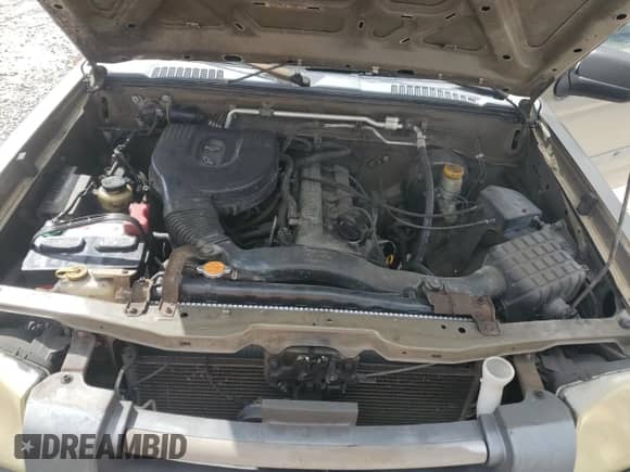 2002 Nissan Frontier XE with VIN 1N6DD26SX2C318233, listed as a Copart auction lot 89477985 with Not provided miles and Clean title. Bid and sale history available at DreamBid. Image 11.