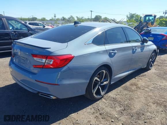 2022 Honda Accord Sport z VIN 1HGCV2F33NA016255, wystawiony jako IAAI lot #43075139 z przebiegiem 10 547 mil mil oraz . Historia ofert i sprzedaży dostępna na DreamBid. Obrazek 4.