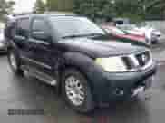 2011 Nissan Pathfinder LE z VIN 5N1AR1NB4BC627114, wystawiony jako IAAI lot #42713940 z przebiegiem 192 036 mil mil oraz . Historia ofert i sprzedaży dostępna na DreamBid. Obrazek 1.