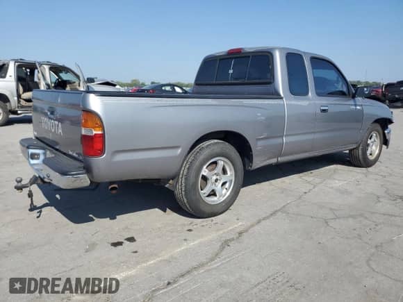 1995 Toyota Tacoma z VIN 4TAUN53B3SZ020458, wystawiony jako Copart lot #71509355 z przebiegiem 146 447 mil mil oraz Czysty tytuł • Clean title. Historia ofert i sprzedaży dostępna na DreamBid. Obrazek 3.