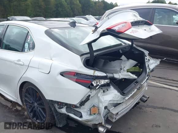 2022 Toyota Camry TRD с VIN 4T1KZ1AK0NU068167, выставлен на аукционе IAAI как лот 43437191 с пробегом 79 018 миль миль и . История ставок и продаж доступна на DreamBid. Изображение 22.