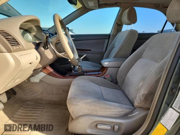 2002 Toyota Camry XLE z VIN JTDBE30K920081970, wystawiony jako Copart lot #82324435 z przebiegiem 205 560 mil mil oraz Szkoda całkowita • Salvage title. Historia ofert i sprzedaży dostępna na DreamBid. Obrazek 7.