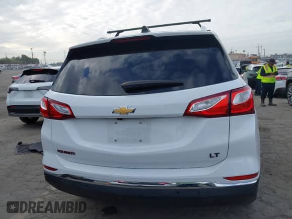 2018 Chevrolet Equinox LT с VIN 2GNAXJEV0J6352926, выставлен на аукционе IAAI как лот 43259696 с пробегом 70 395 миль миль и . История ставок и продаж доступна на DreamBid. Изображение 17.