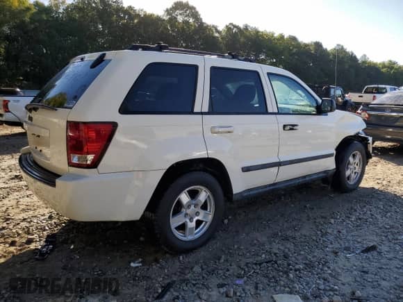 2007 Jeep Grand Cherokee Laredo z VIN 1J8GS48K57C516670, wystawiony jako Copart lot #85153775 z przebiegiem 250 683 mil mil oraz Szkoda całkowita • Salvage title. Historia ofert i sprzedaży dostępna na DreamBid. Obrazek 3.