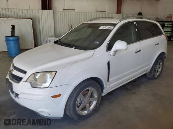 2013 Chevrolet Captiva Sport LT с VIN 3GNAL3EK4DS601408, выставлен на аукционе Copart как лот 77042154 с пробегом 125 288 миль миль и Чистый • Clean title. История ставок и продаж доступна на DreamBid. Изображение 1.