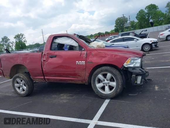 2014 Ram 1500 Express z VIN 3C6JR6ATXEG310186, wystawiony jako IAAI lot #42221601 z przebiegiem 56 684 mil mil oraz . Historia ofert i sprzedaży dostępna na DreamBid. Obrazek 13.