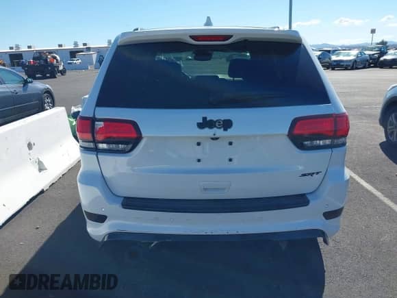 2021 Jeep Grand Cherokee SRT with VIN 1C4RJFDJ3MC561128, listed as a IAAI auction lot 43529278 with Not provided miles and . Bid and sale history available at DreamBid. Image 19.