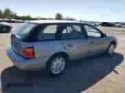 1997 Saturn SW with VIN 1G8ZK8274VZ194085, listed as a Copart auction lot 50230135 with 211,051 mi miles and Salvage title. Bid and sale history available at DreamBid. Image 3.
