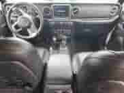 2023 Jeep Wrangler Rubicon с VIN 1C4JJXR6XPW518125, выставлен на аукционе Copart как лот 57597475 с пробегом 24 235 миль миль и Списание • Salvage title. История ставок и продаж доступна на DreamBid. Изображение 8.