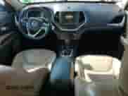 2016 Jeep Cherokee Latitude with VIN 1C4PJMCB2GW100138, listed as a Copart auction lot 64548445 with 211,628 mi miles and Salvage title. Bid and sale history available at DreamBid. Image 8.