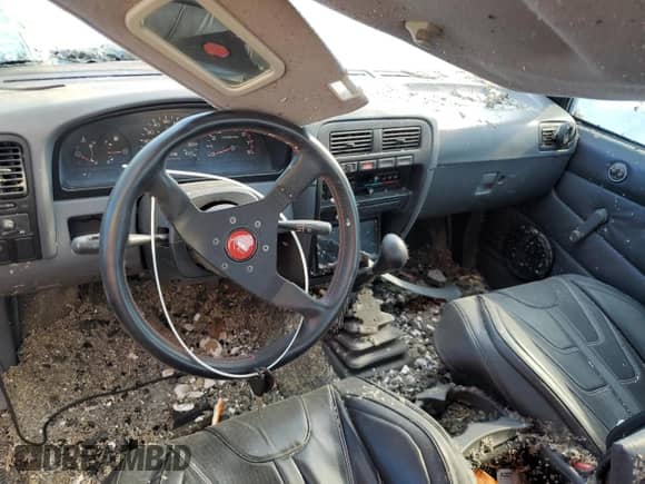 1995 Nissan Frontier with VIN 1N6SD11S7SC475209, listed as a Copart auction lot 67856375 with 246,193 mi miles and Salvage title. Bid and sale history available at DreamBid. Image 8.